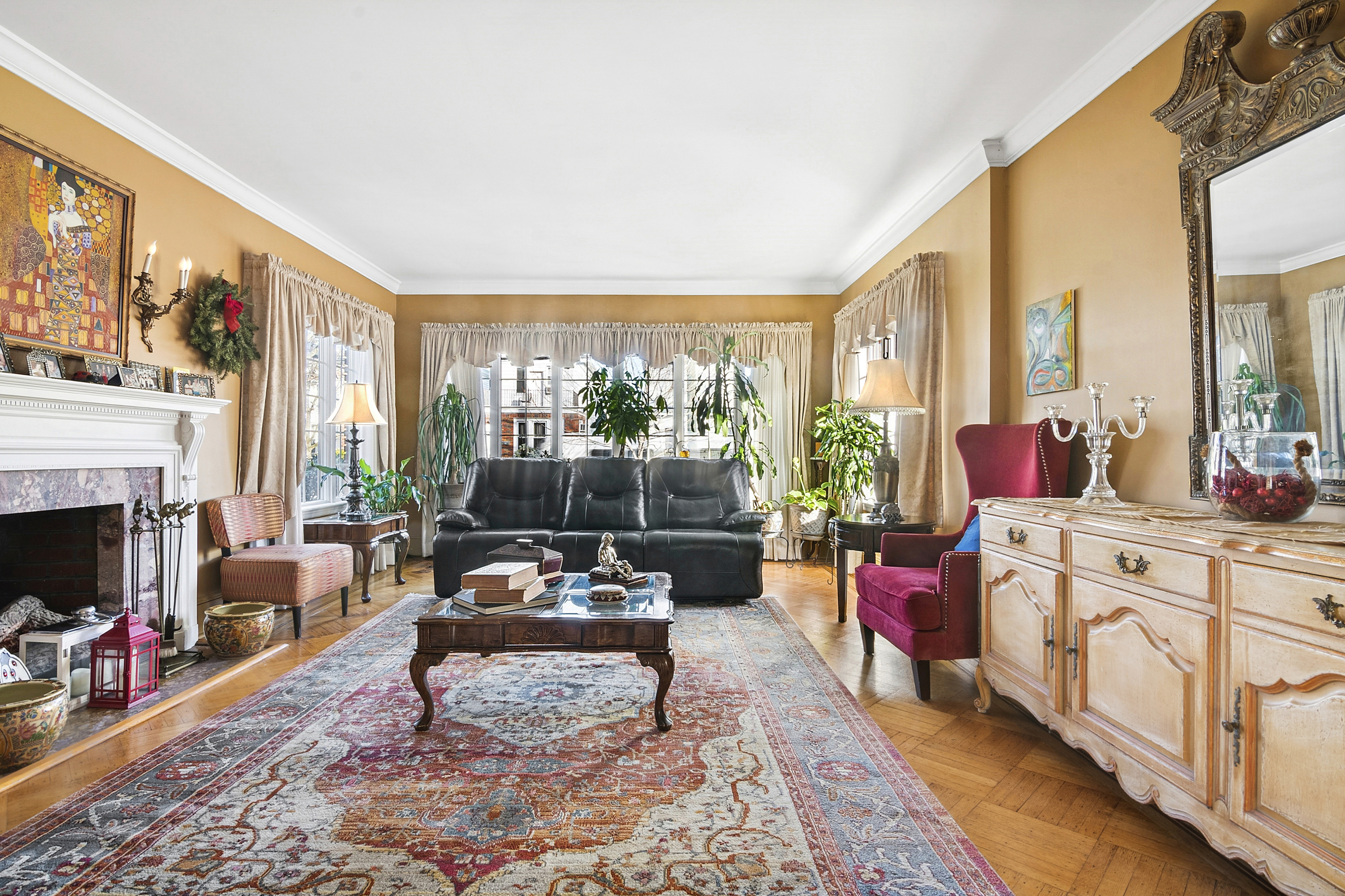 1384 East 29th Street Brooklyn, NY 11210 - Photo 2 of 21 a living room with furniture fireplace and large windows