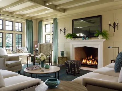 a work room with furniture and a chandelier