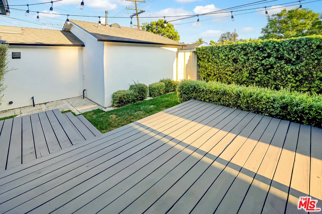 a view of a building with a garden