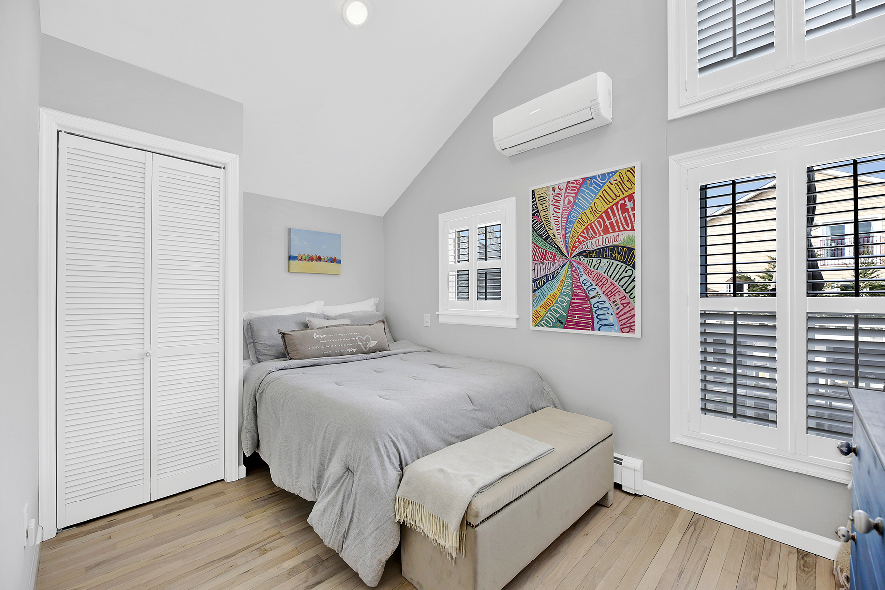 4-53 Beach 142nd Street Queens, NY 11694 - Photo 22 of 39 a bedroom with a bed and a window