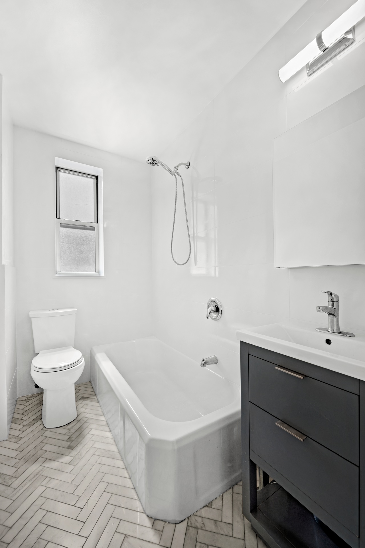 720 Fort Washington Avenue, Unit 6D Manhattan, NY 10040 - Photo 6 of 7 a bathroom with a sink toilet and a bathtub