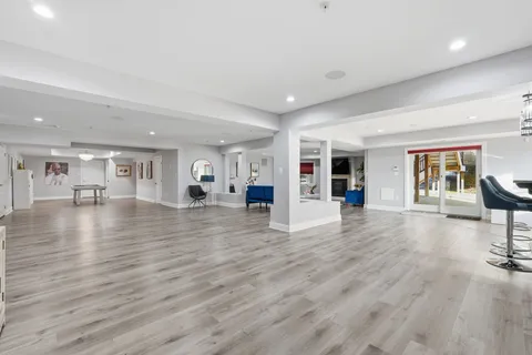 a view of a living room and hardwood floor