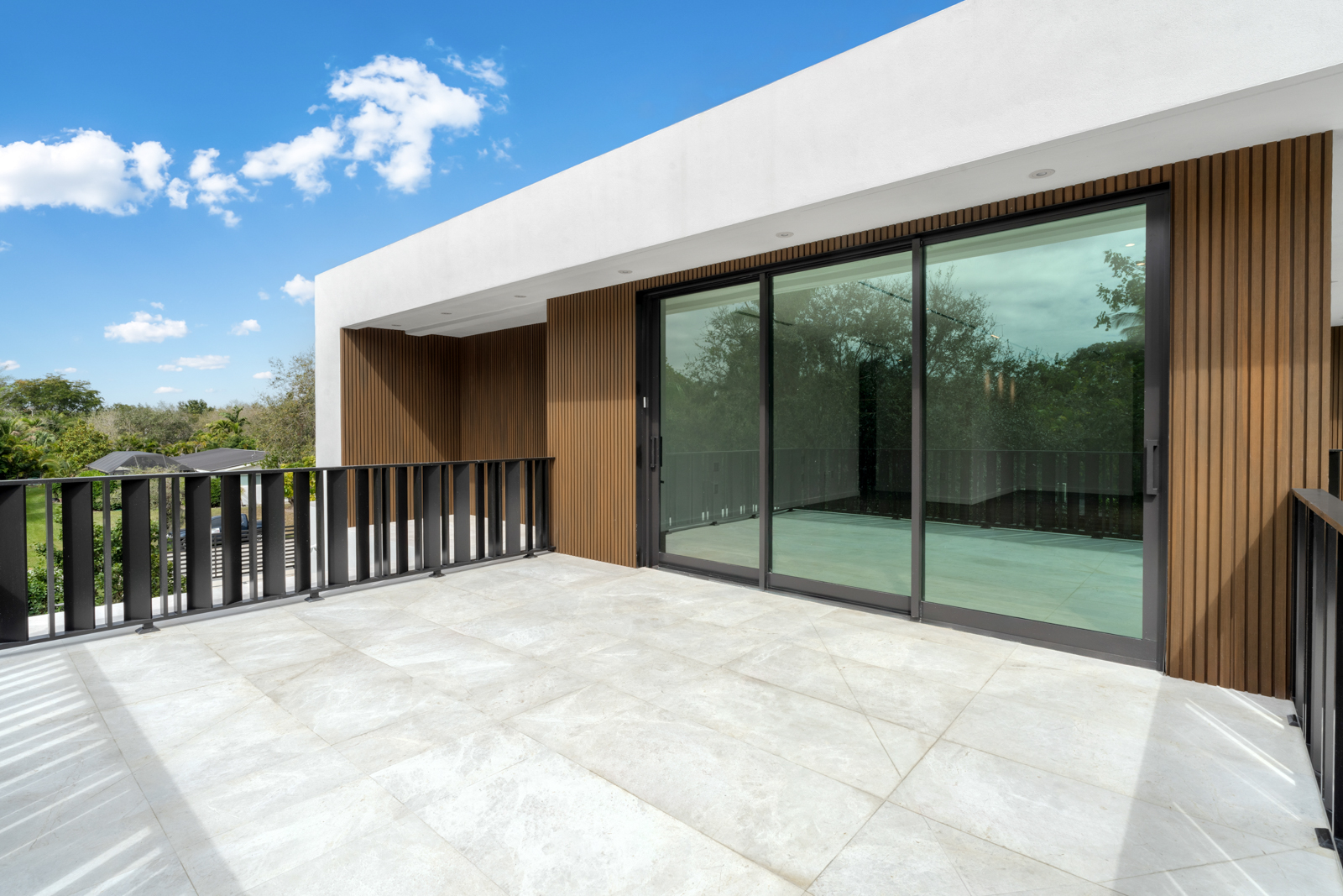 6920 Southwest 124th Street Pinecrest, FL 33156 - Photo 30 of 48 a view of backyard with balcony