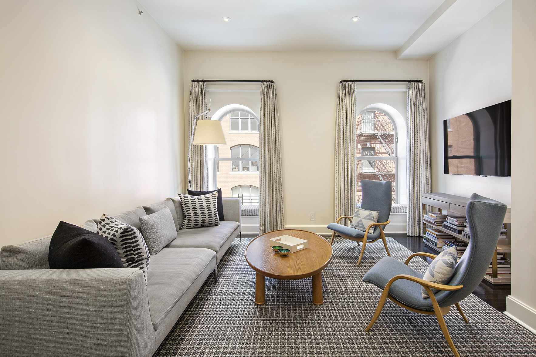 92 Laight Street, Unit 5I Manhattan, NY 10013 - Photo 2 of 12 a living room with furniture