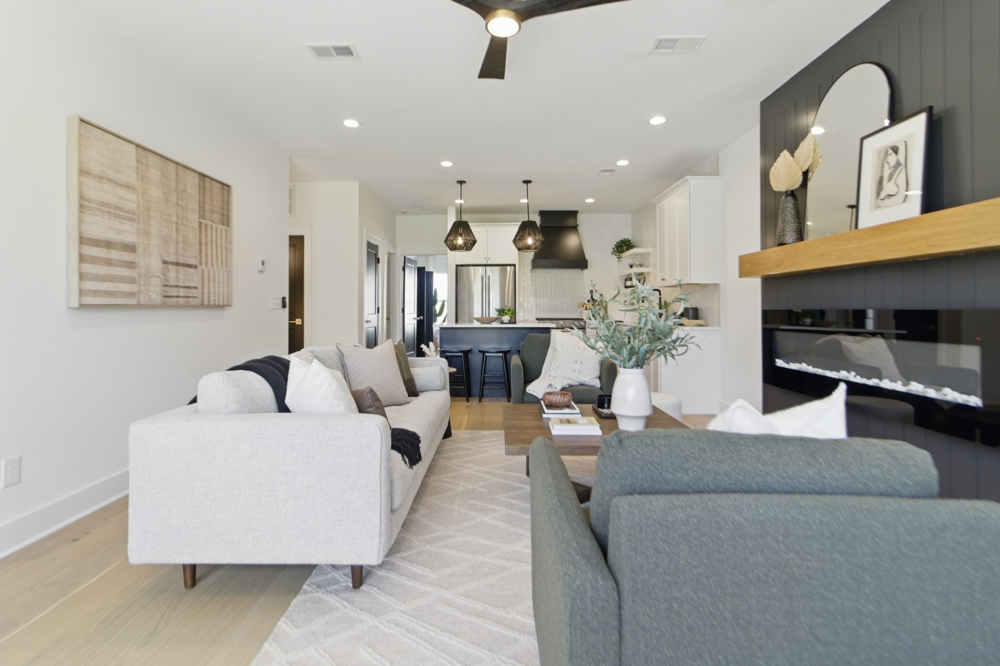 824 Watts Lane, Unit B Nashville, TN 37209 - Photo 8 of 23 a living room with furniture and a chandelier