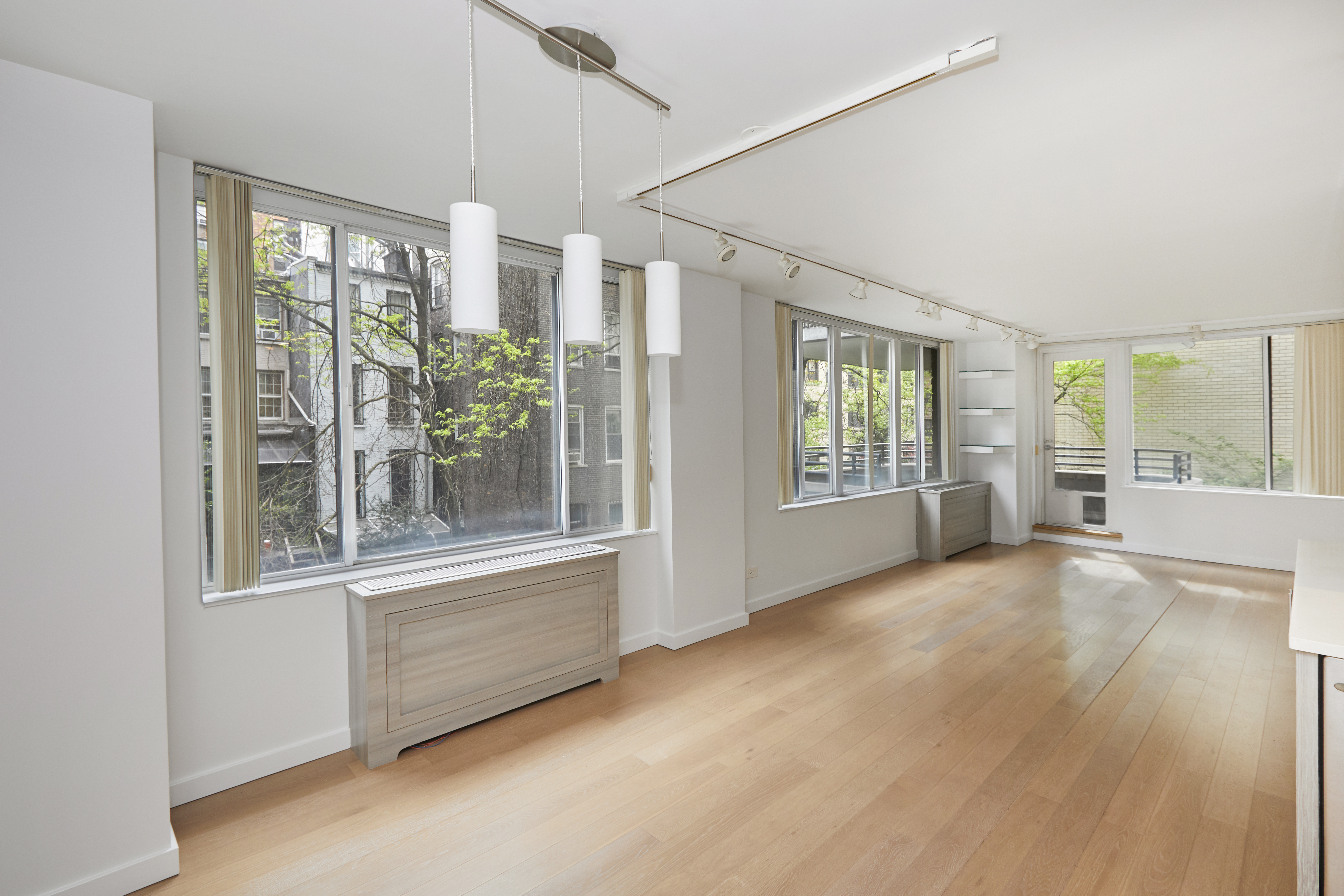 309 East 49th Street, Unit 3D Manhattan, NY 10017 - Photo 1 of 11 a view of an empty room with a window