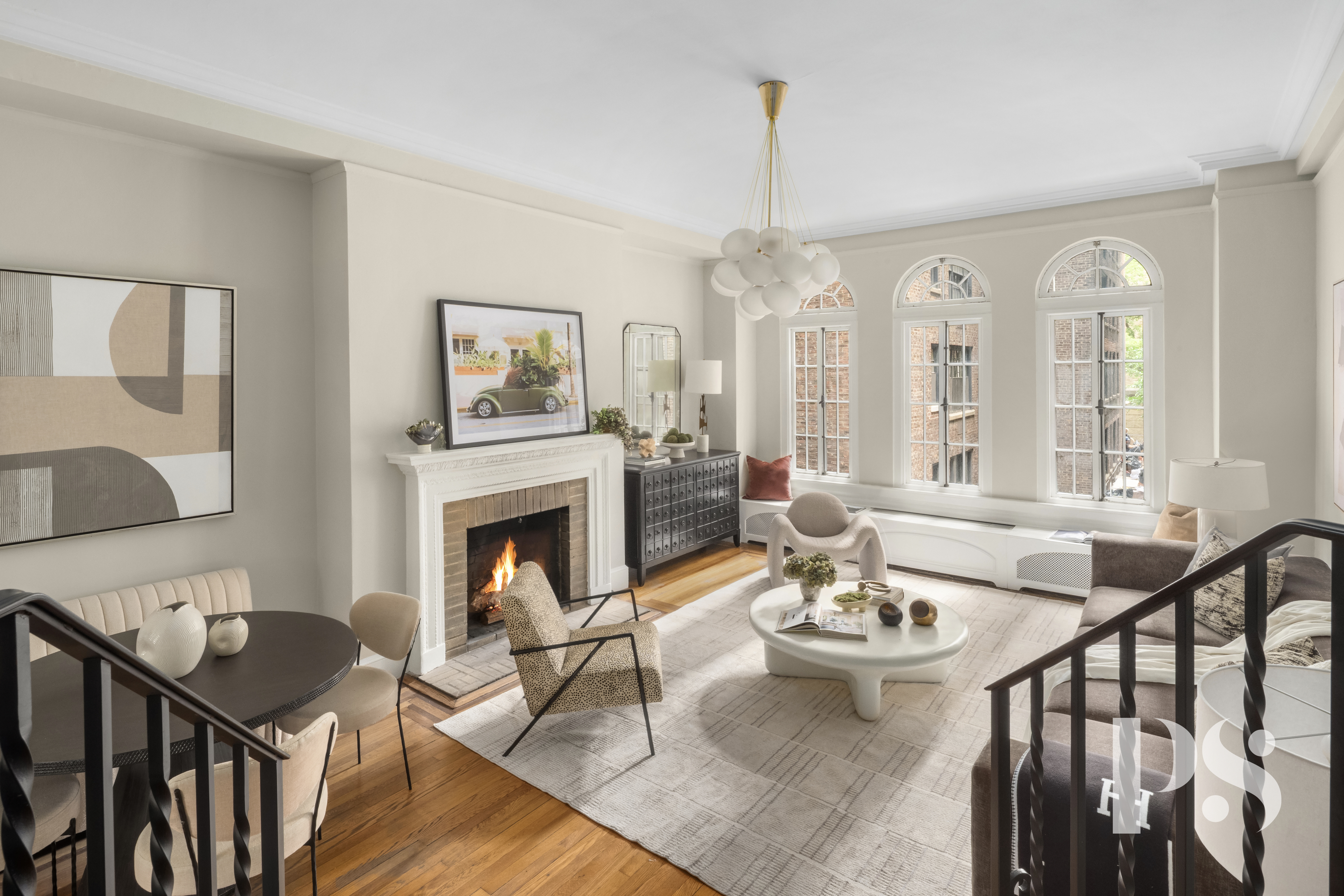 35 East 9th Street, Unit 33 Manhattan, NY 10003 - Photo 3 of 14 a view of a livingroom with furniture window and wooden floor