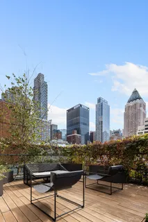 a view of a city with tall buildings