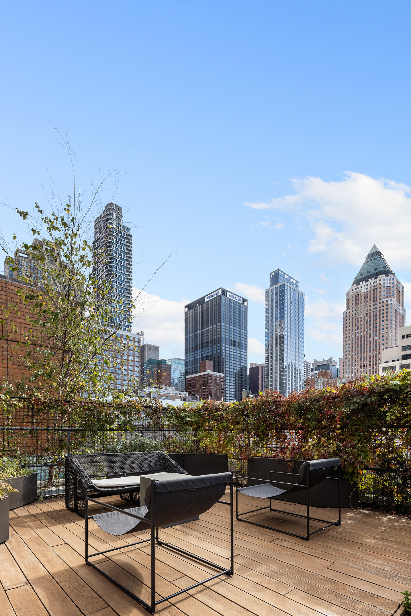 345 West 54th Street Manhattan, NY 10019 - Photo 16 of 22 a view of a city with tall buildings