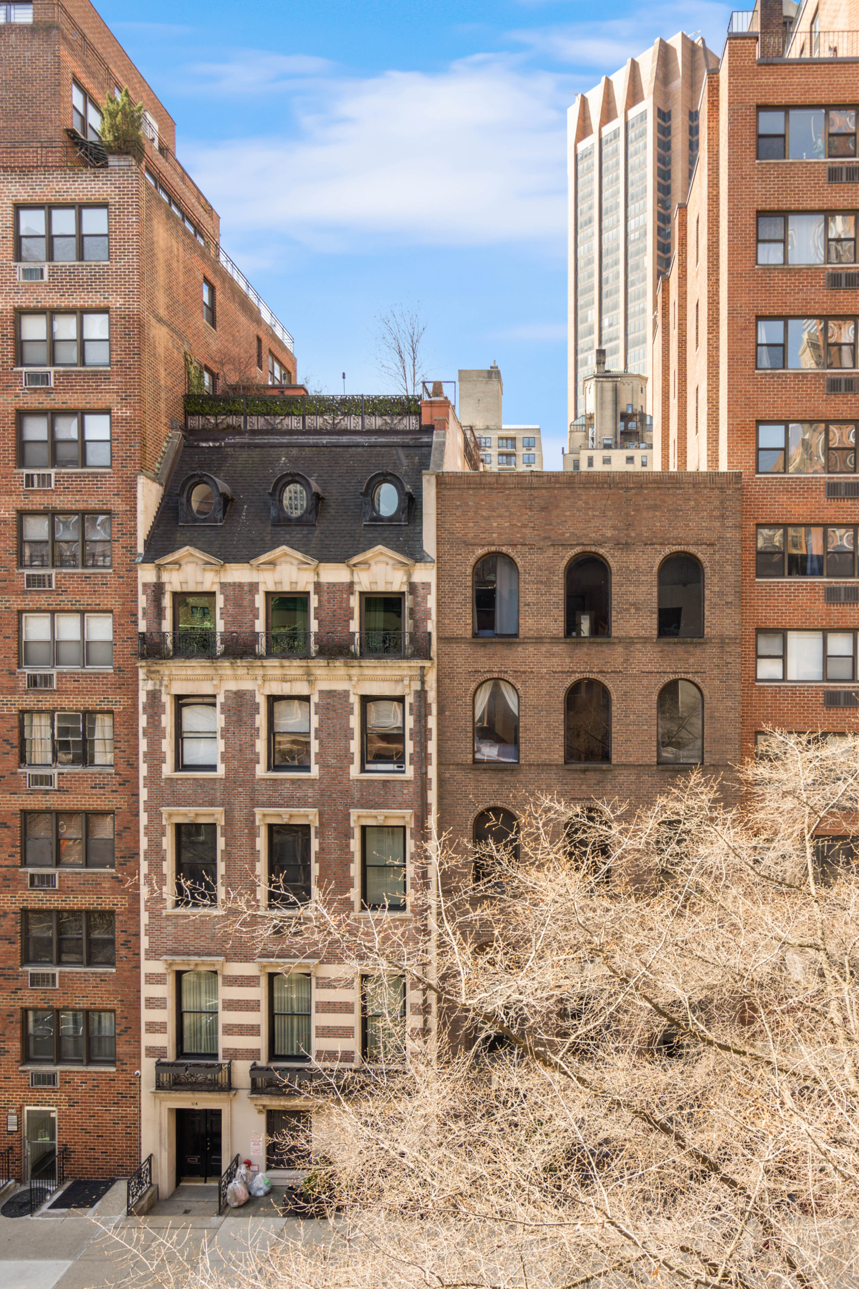111 East 36th Street, Unit 4A Manhattan, NY 10016 - Photo 5 of 19 a front view of a building with parking space