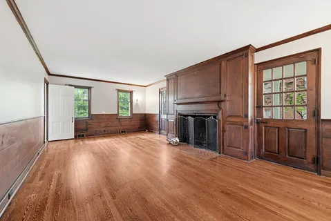 a view of livingroom with hardwood floor and hallway