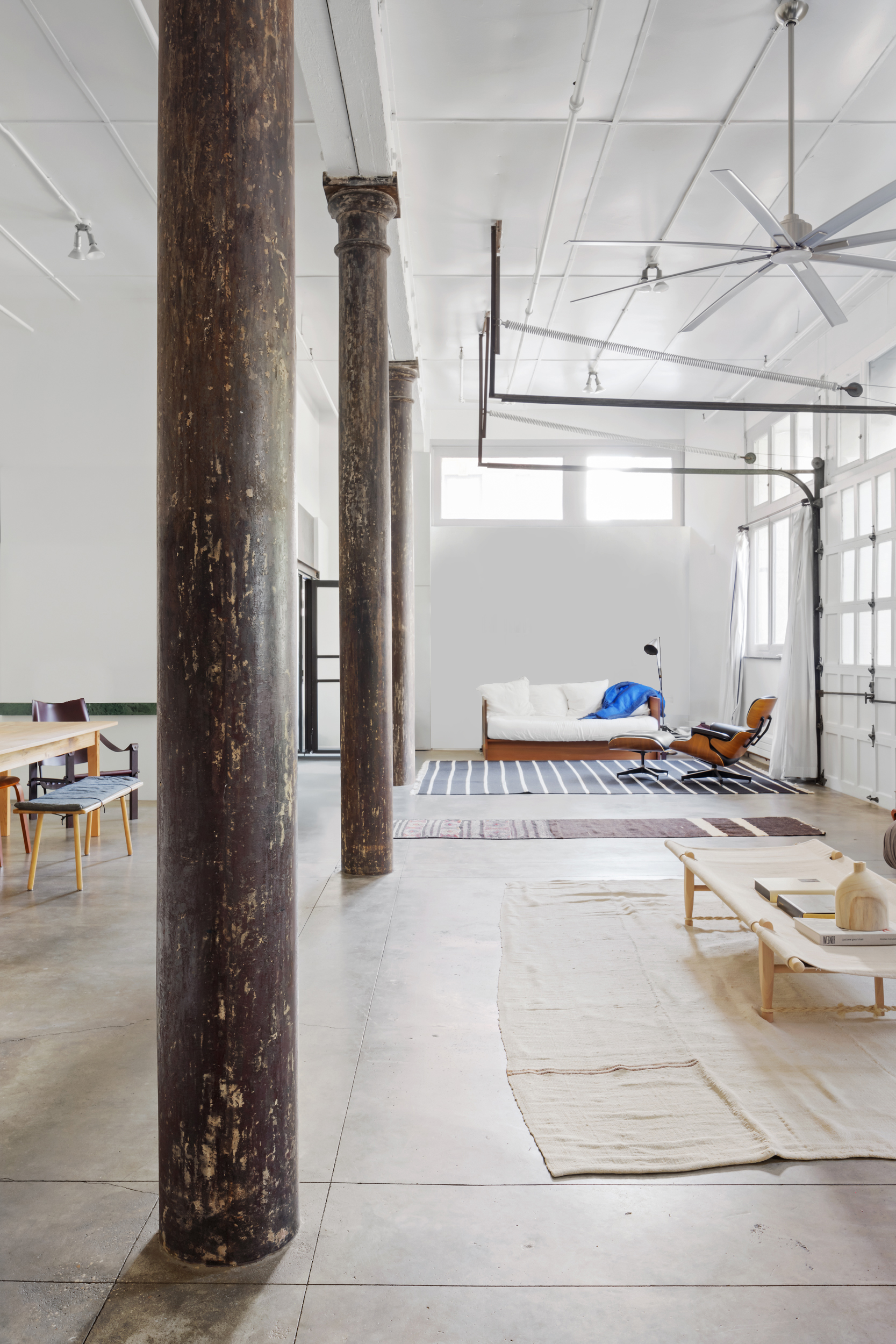 125 Watts Street, Unit 1 Manhattan, NY 10013 - Photo 7 of 24 a kitchen with a sink and cabinets