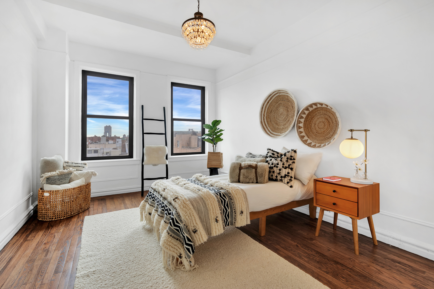 172 East 4th Street, Unit 8F Manhattan, NY 10009 - Photo 4 of 11 a bedroom with bed and a window