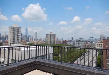 a view of city from a balcony