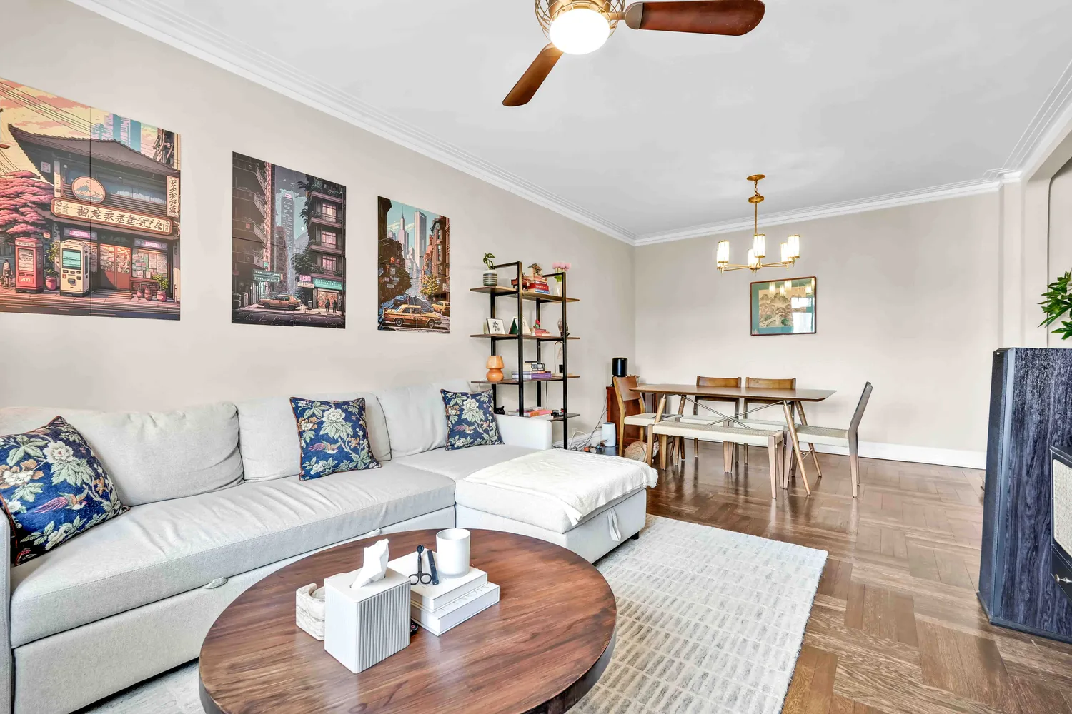 a living room with furniture and wooden floor
