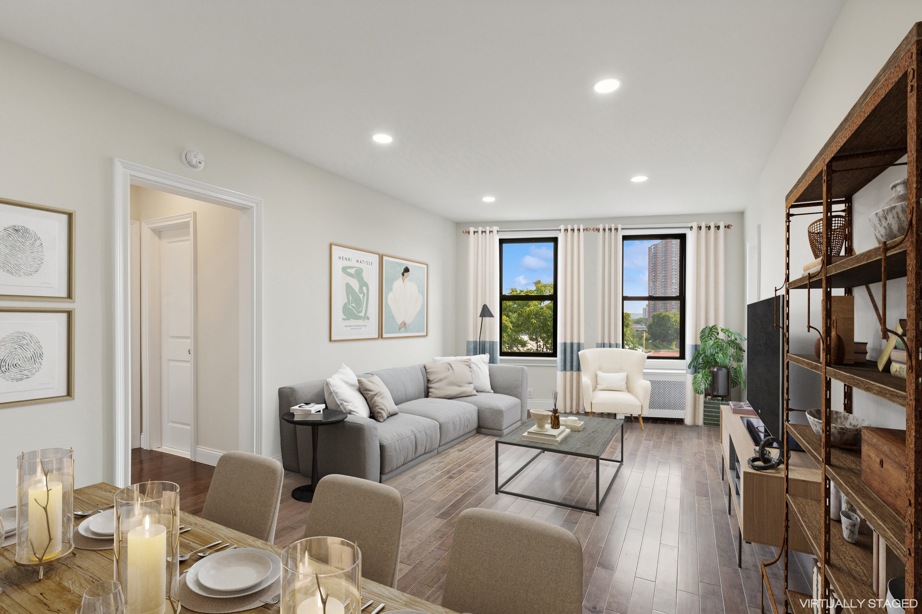 270 Seaman Avenue, Unit D3 Manhattan, NY 10034 - Photo 1 of 22 a living room with furniture large window and a flat screen tv