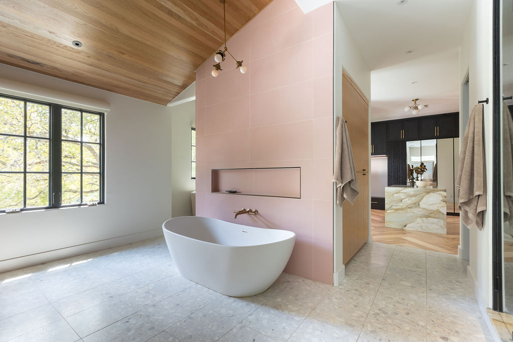 400 Inwood Road Austin, TX 78746 - Photo 32 of 43 a bathroom with a bathtub and shower