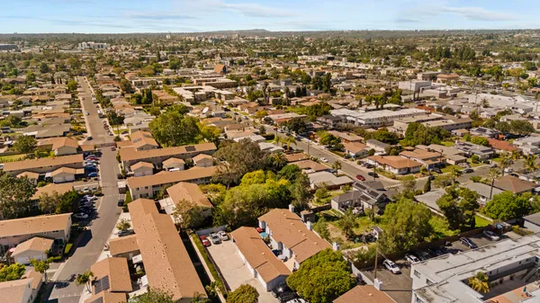 an aerial view of residential house with parking space