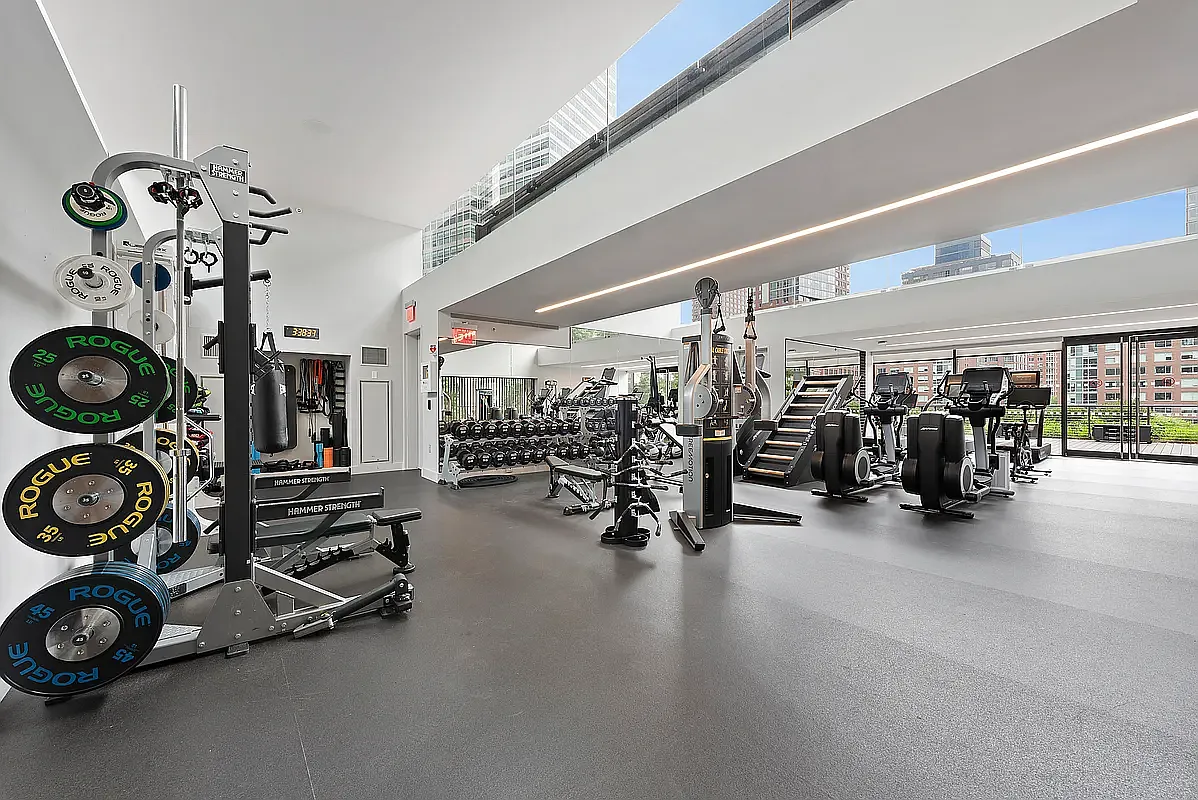 101 Warren Street, Unit 2220 Manhattan, NY 10007 - Photo 15 of 19 a view of a room with gym equipment