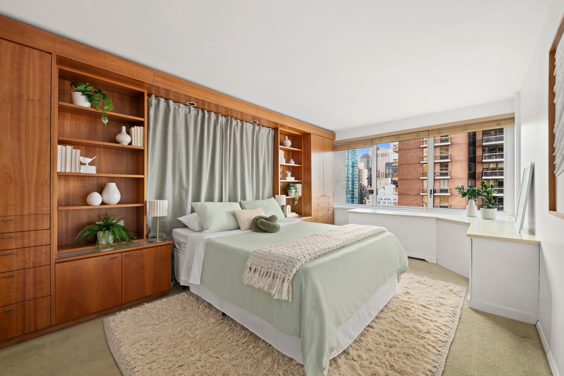 300 East 59th Street, Unit 2103 Manhattan, NY 10022 - Photo 8 of 14 a bedroom with a bed and a window