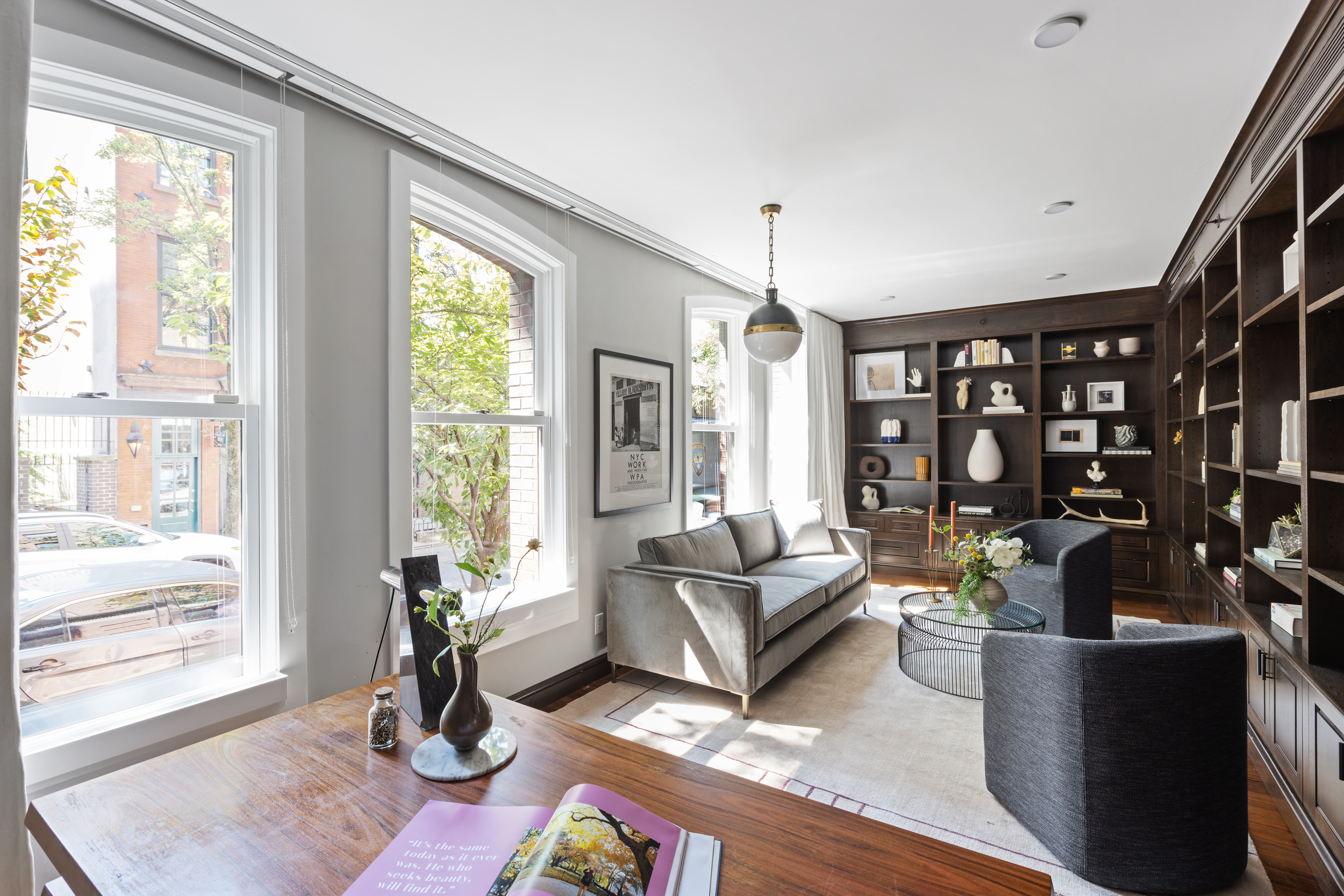 95 Charles Street, Unit TH Manhattan, NY 10014 - Photo 11 of 29 a living room with furniture hard wood floor and a floor to ceiling window