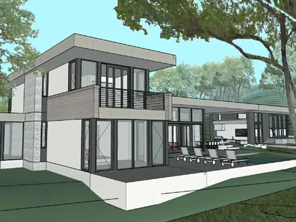 a view of a white house with a large window and yard