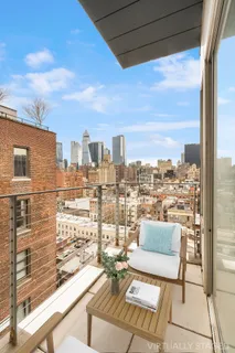a view of a balcony with city view