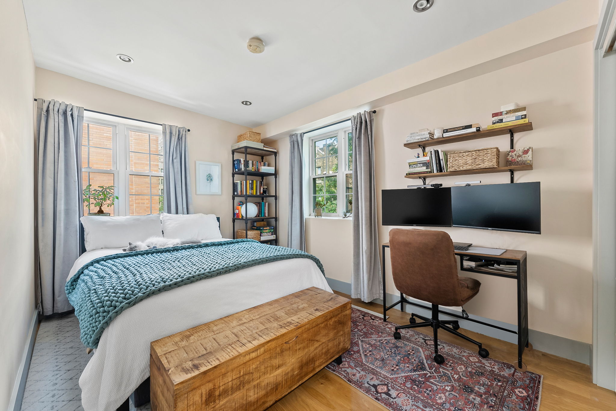 600 Prospect Place, Unit 2 Brooklyn, NY 11238 - Photo 6 of 13 a bedroom with a bed a desk and chair