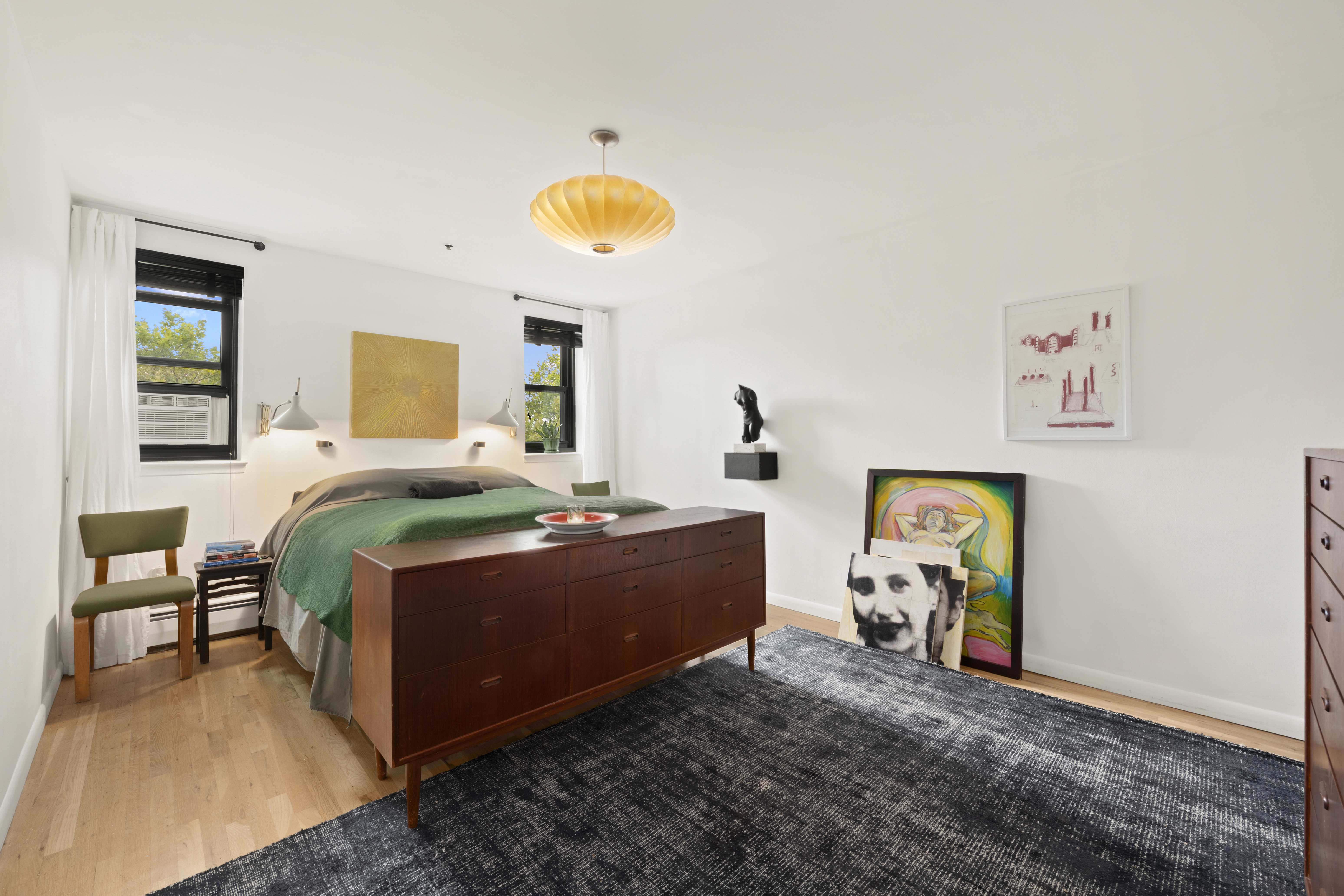 372 Dekalb Avenue, Unit 6E Brooklyn, NY 11205 - Photo 8 of 16 a bed room with a bed and a chair