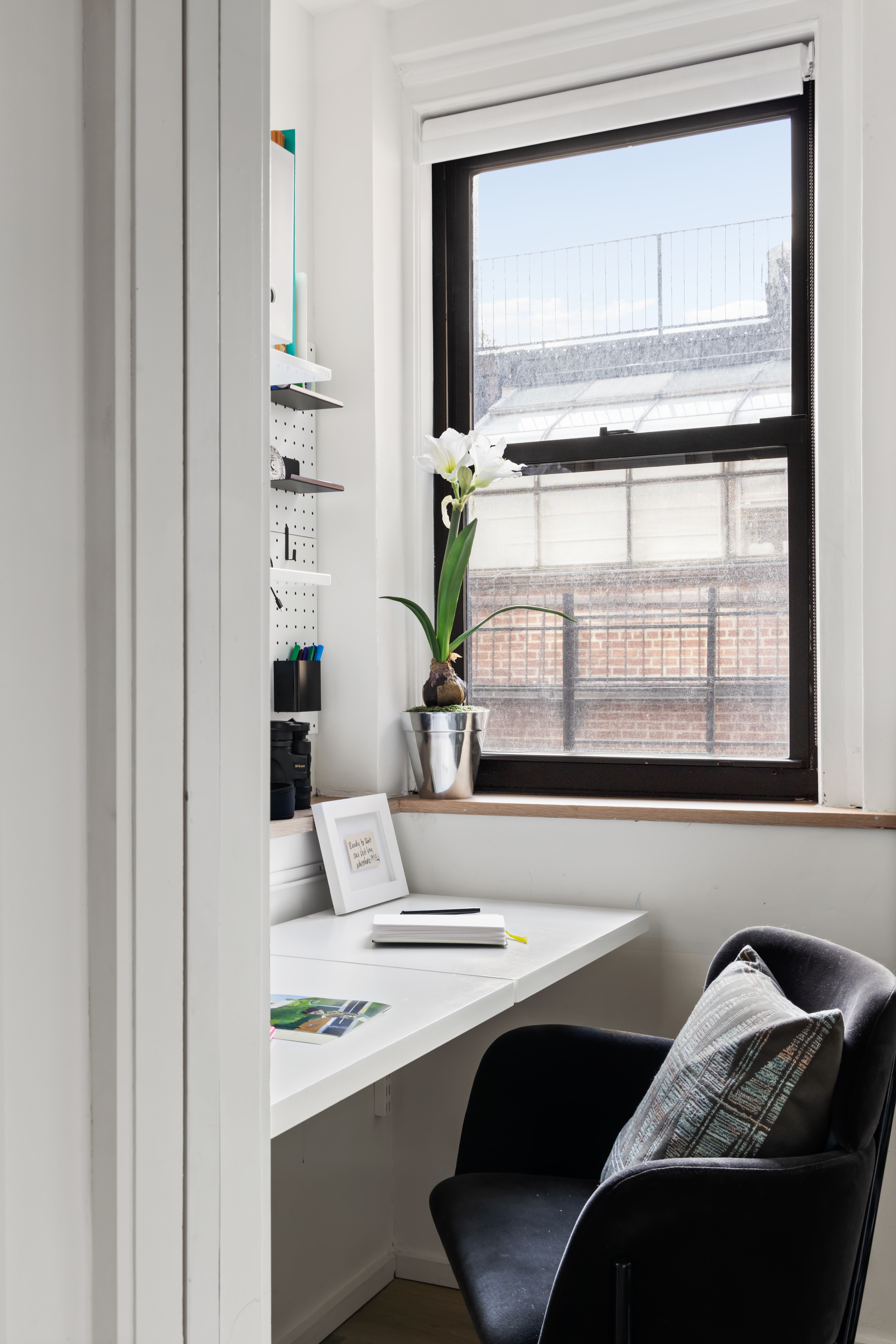 45 5th Avenue, Unit 15CD Manhattan, NY 10003 - Photo 12 of 14 a living room with furniture and a window