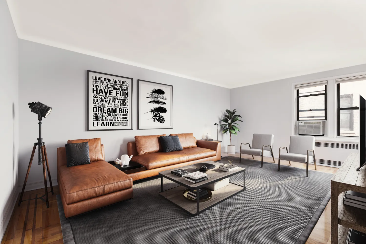 a living room with furniture stairs and a window
