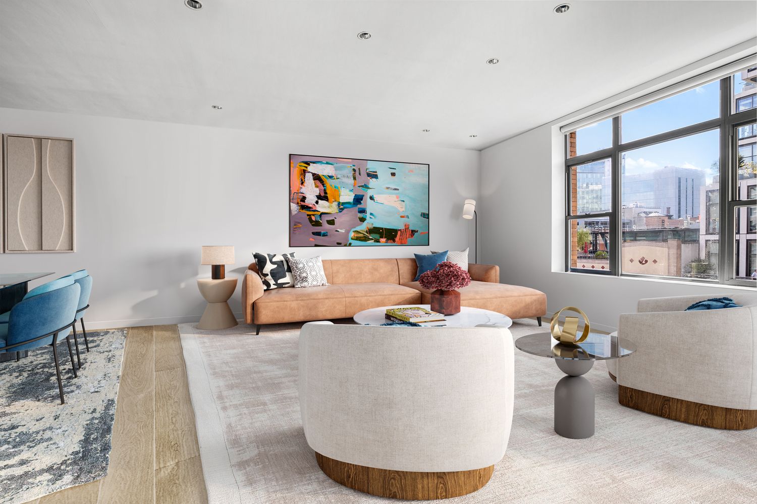 66 9th Avenue, Unit 4W Manhattan, NY 10011 - Photo 1 of 16 a living room with furniture and a large window