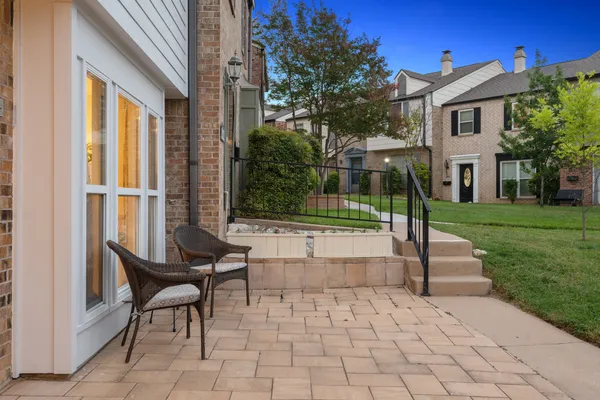 a view of a swimming pool with a lounge chair