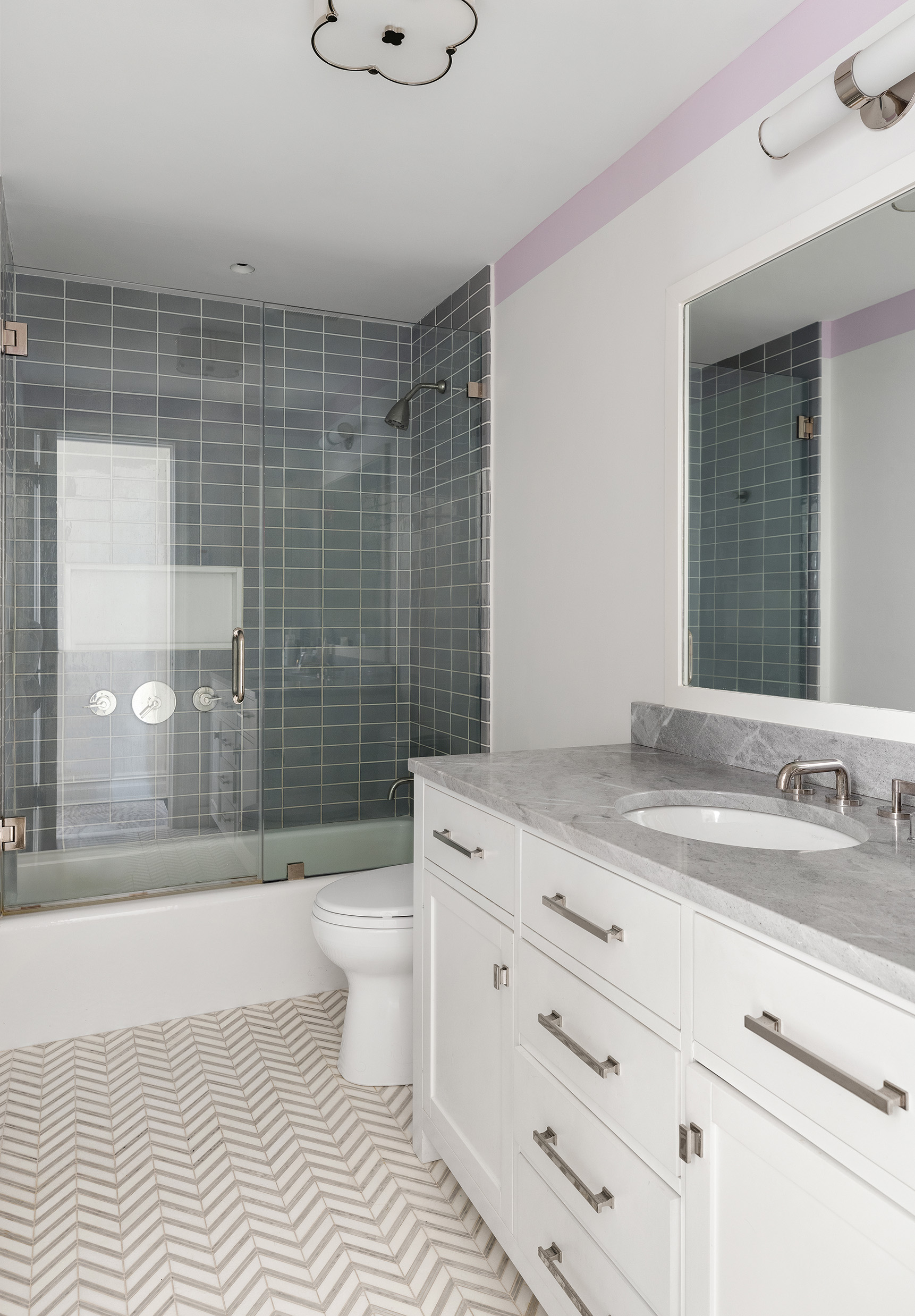 135 West 77th Street Manhattan, NY 10024 - Photo 22 of 32 a bathroom with a sink a toilet and shower