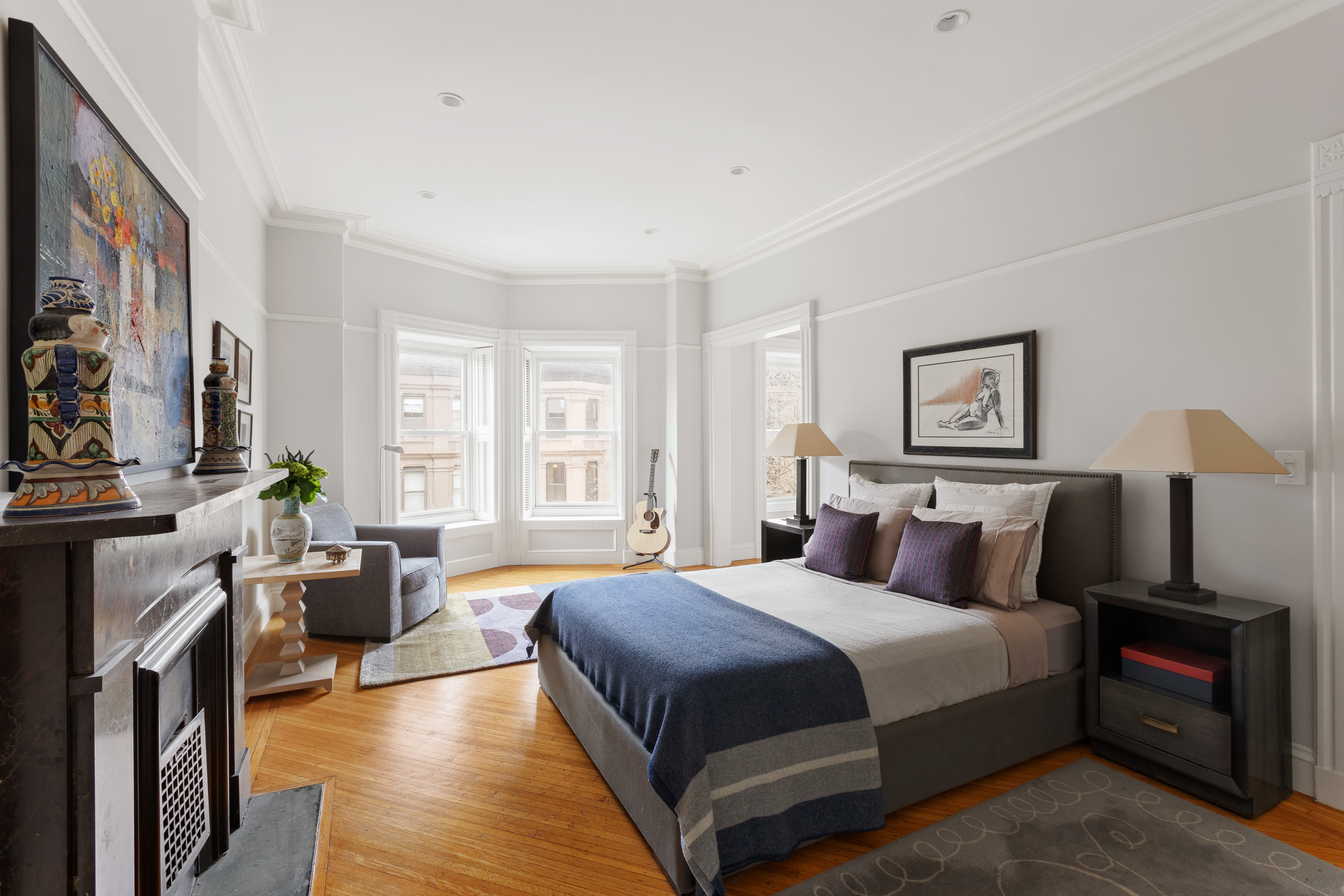 196 Berkeley Place Brooklyn, NY 11217 - Photo 16 of 25 a bedroom with a bed and a couch