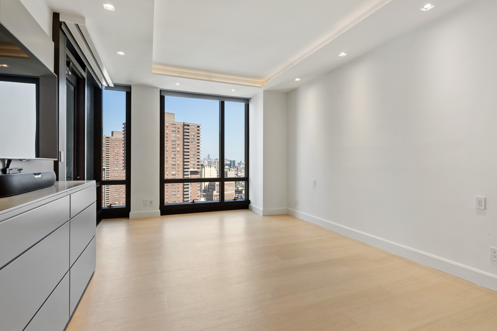 101 Warren Street, Unit 2420 Manhattan, NY 10007 - Photo 10 of 23 a view of an empty room and a window