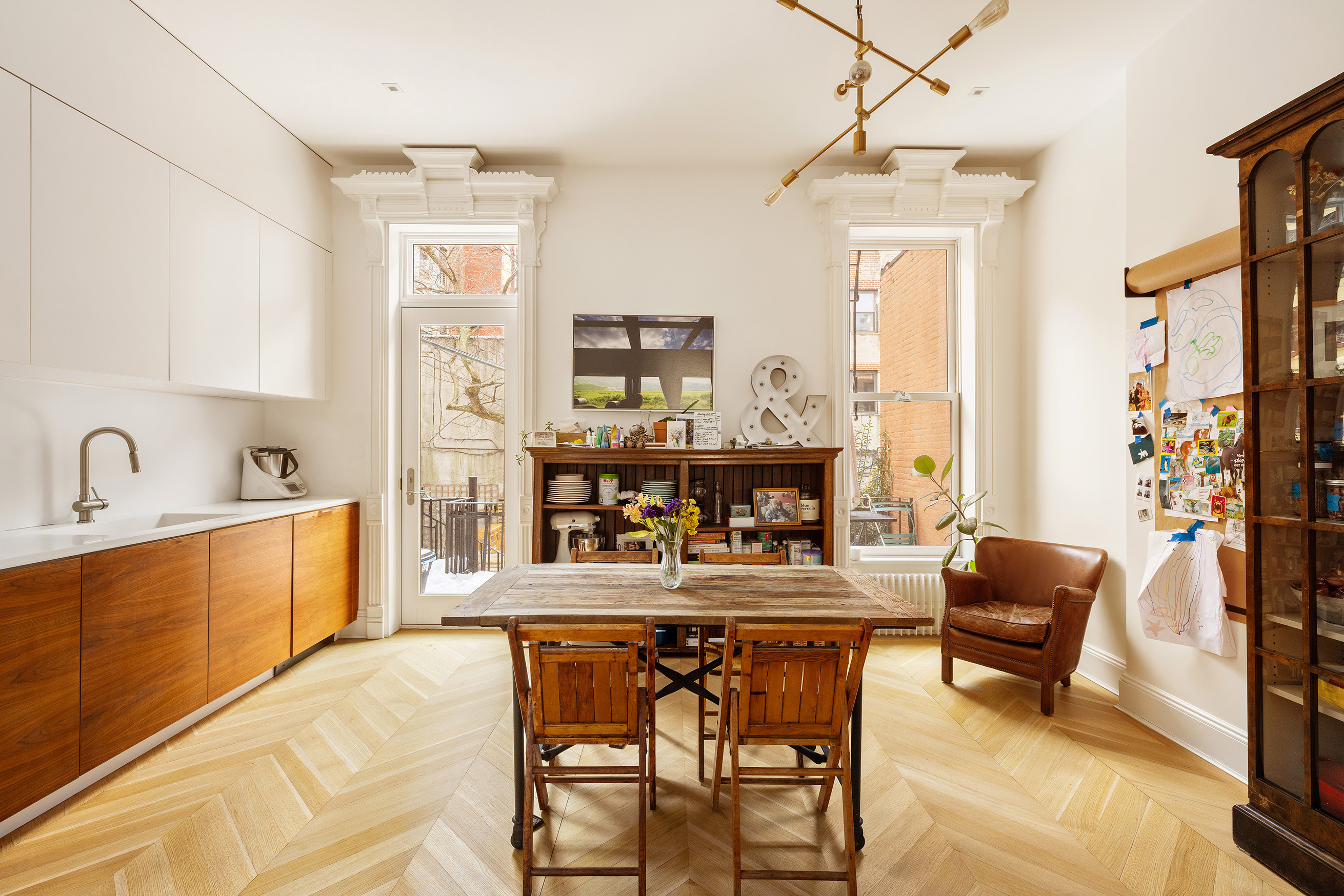 240 St Johns Place, Unit 1 Brooklyn, NY 11217 - Photo 3 of 13 a living room with furniture and a wooden floor
