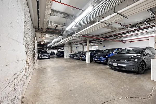 9 College Place, Unit 2K Brooklyn, NY 11201 - Photo 13 of 17 a view of parking garage with cars