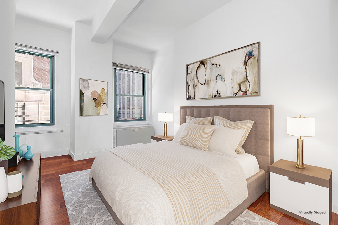 80 John Street, Unit 2F Manhattan, NY 10038 - Photo 3 of 7 a bedroom with bed and wooden floor