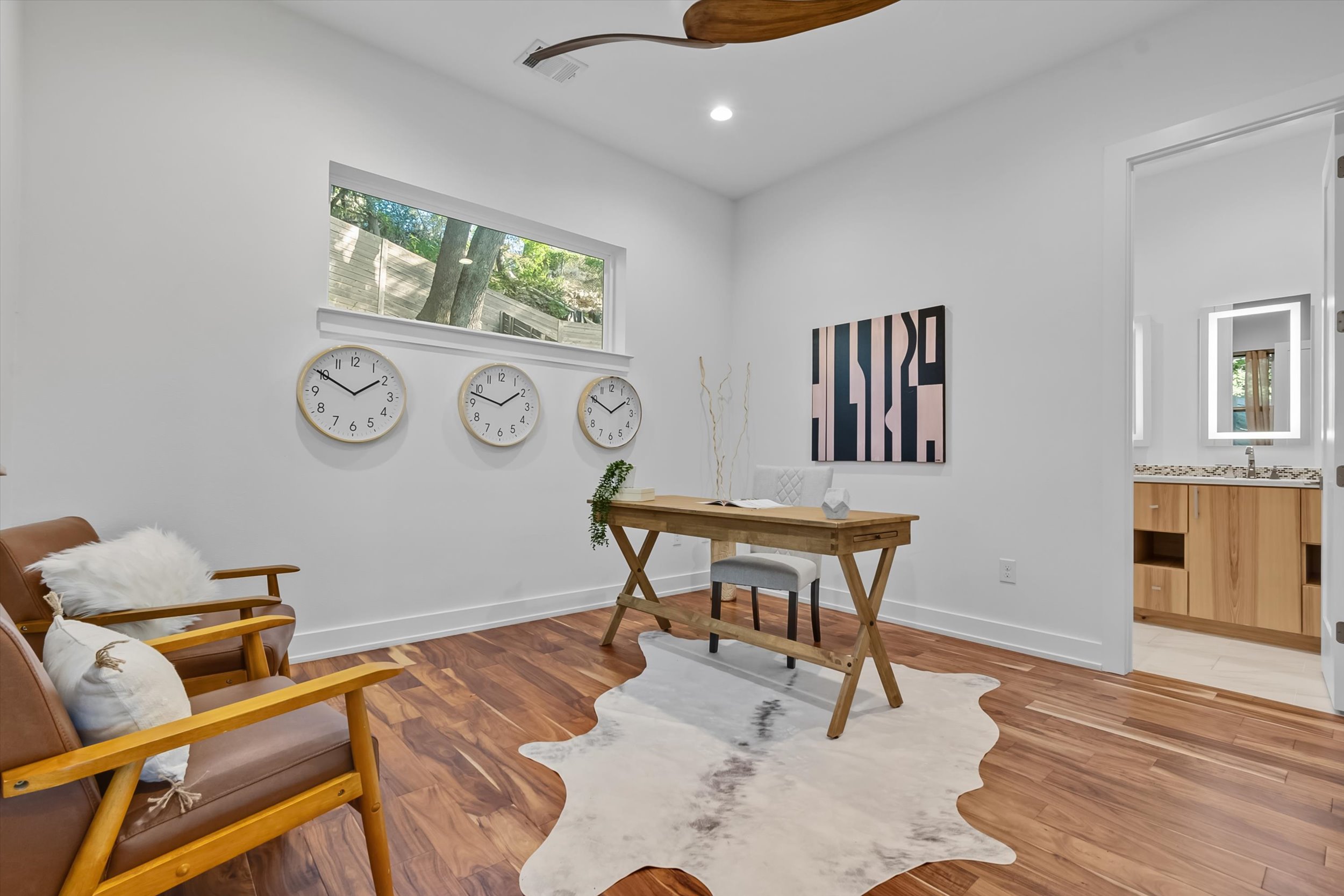 2712 Oak Springs Drive, Unit A Austin, TX 78702 - Photo 13 of 26 a workspace with furniture and window