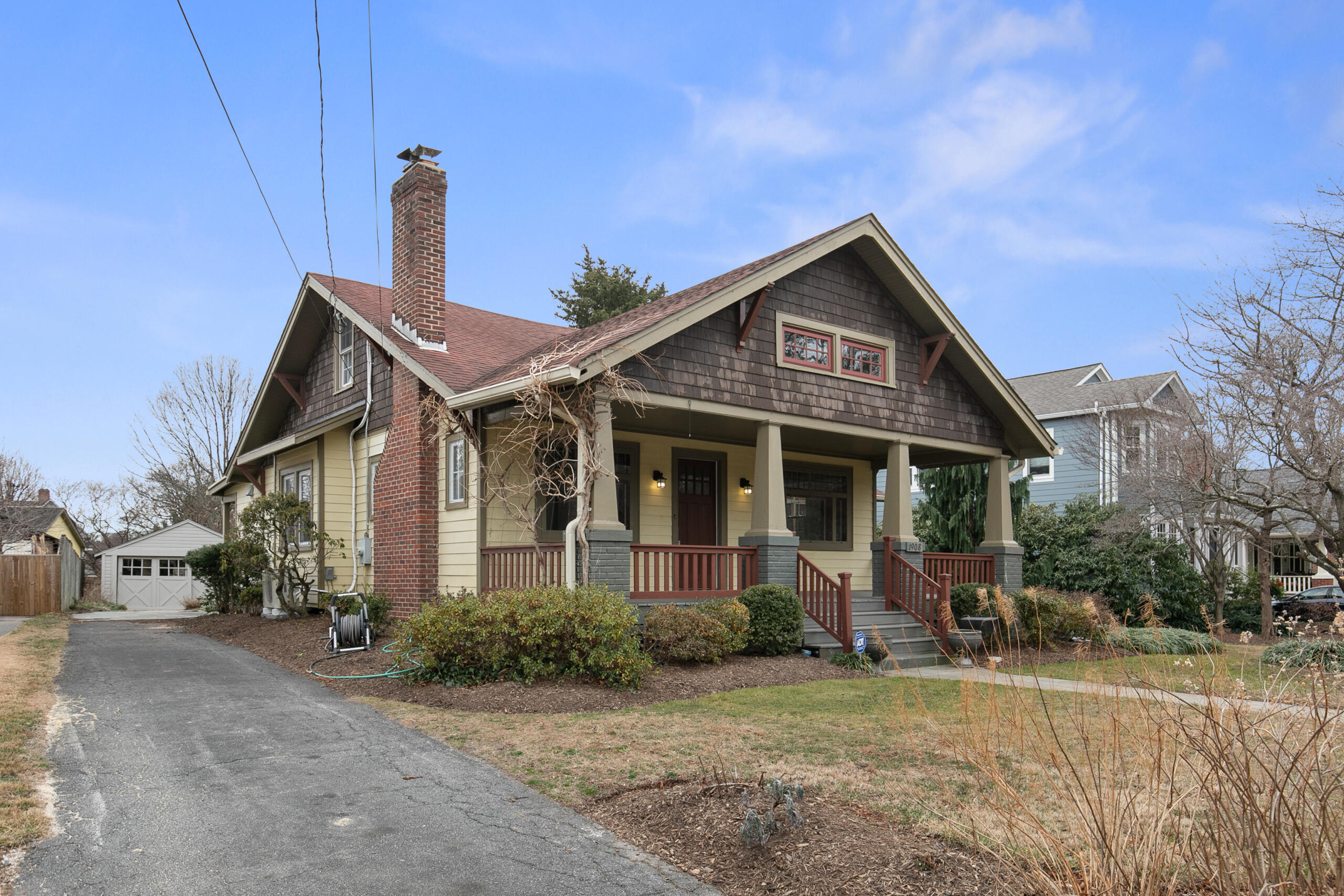 1908 Glen Ross Road Silver Spring, MD 20910 - Photo 2 of 63 a front view of a house with garden