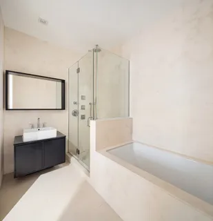 a kitchen with a stove a sink and a microwave