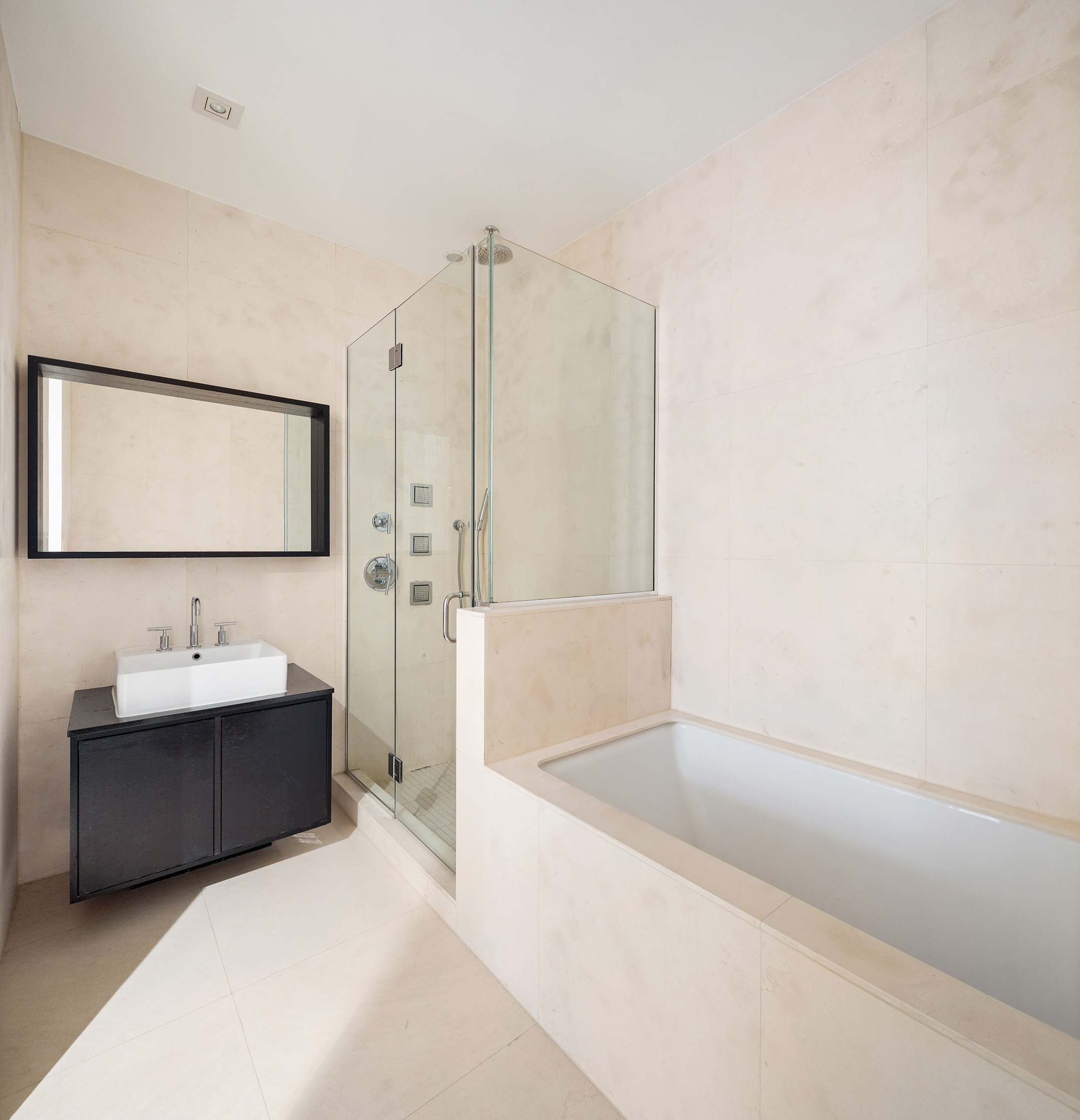 Park Ave S, Unit 7PR Manhattan, NY 10010 - Photo 8 of 15 a bathroom with a tub sink and mirror