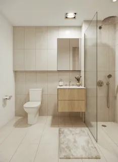 a bathroom with a toilet sink and shower