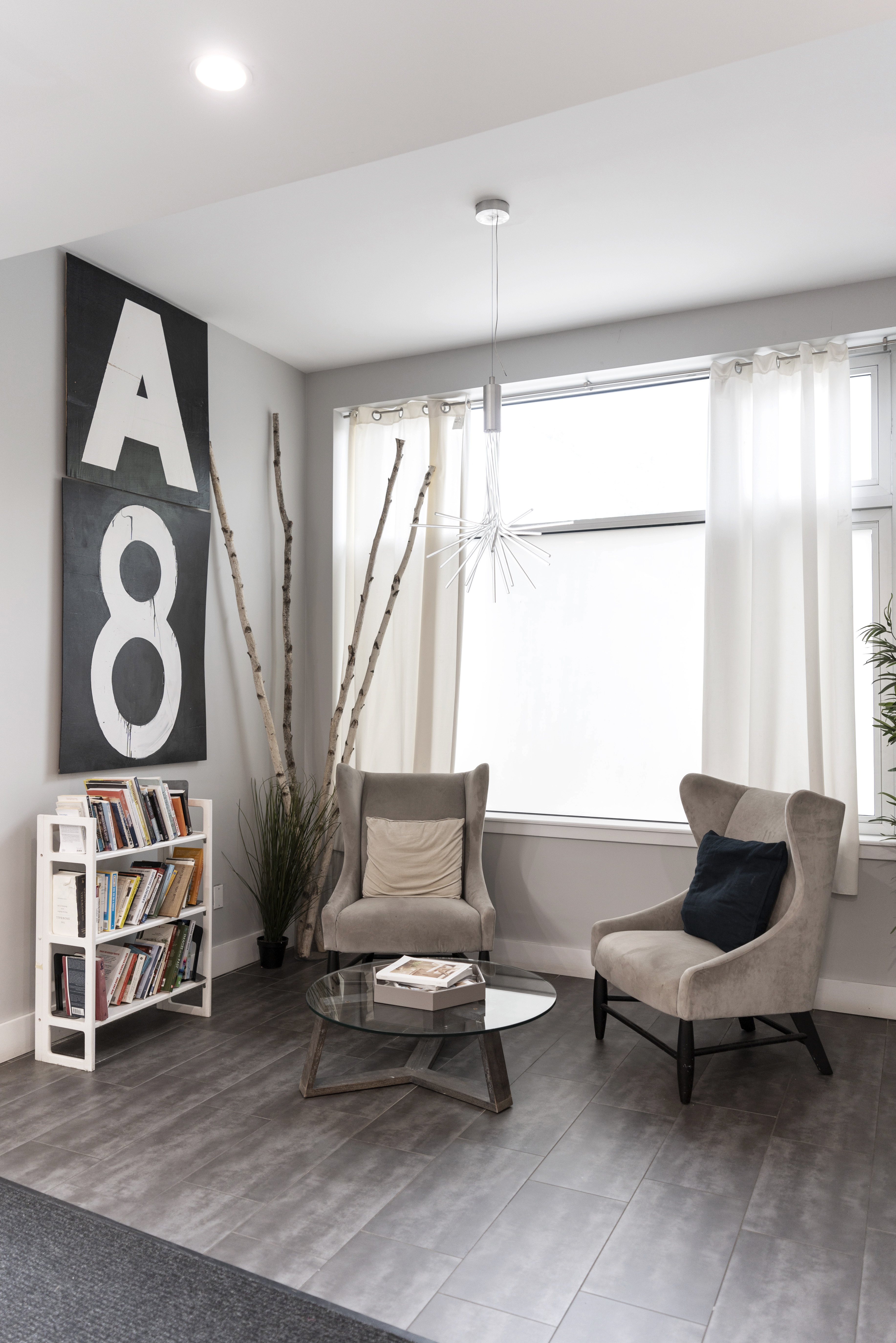 390 Lorimer Street, Unit 3H Brooklyn, NY 11206 - Photo 11 of 13 a living room with furniture and a large window