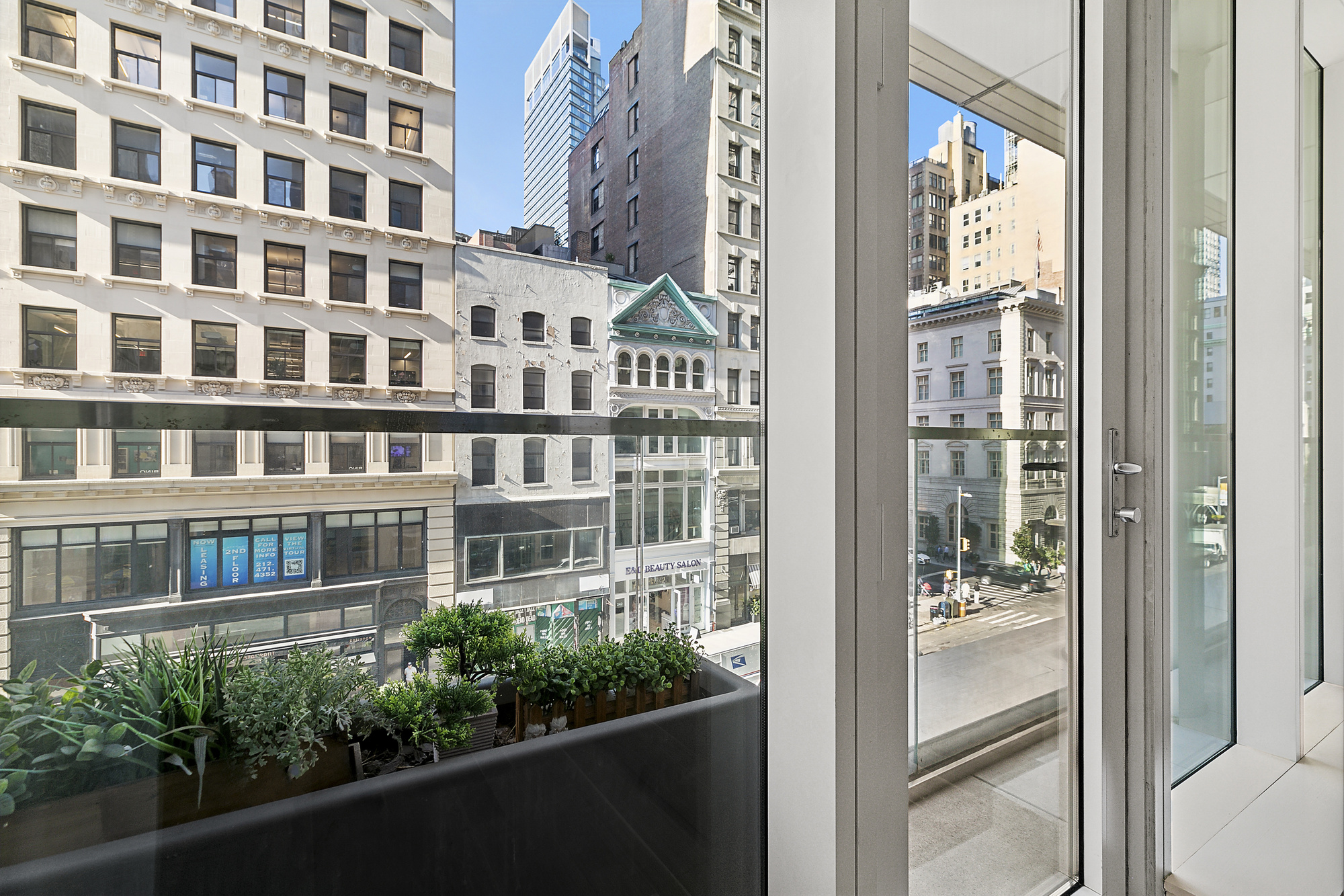 241 5th Avenue, Unit 4B Manhattan, NY 10016 - Photo 3 of 12 a view of a building from a window