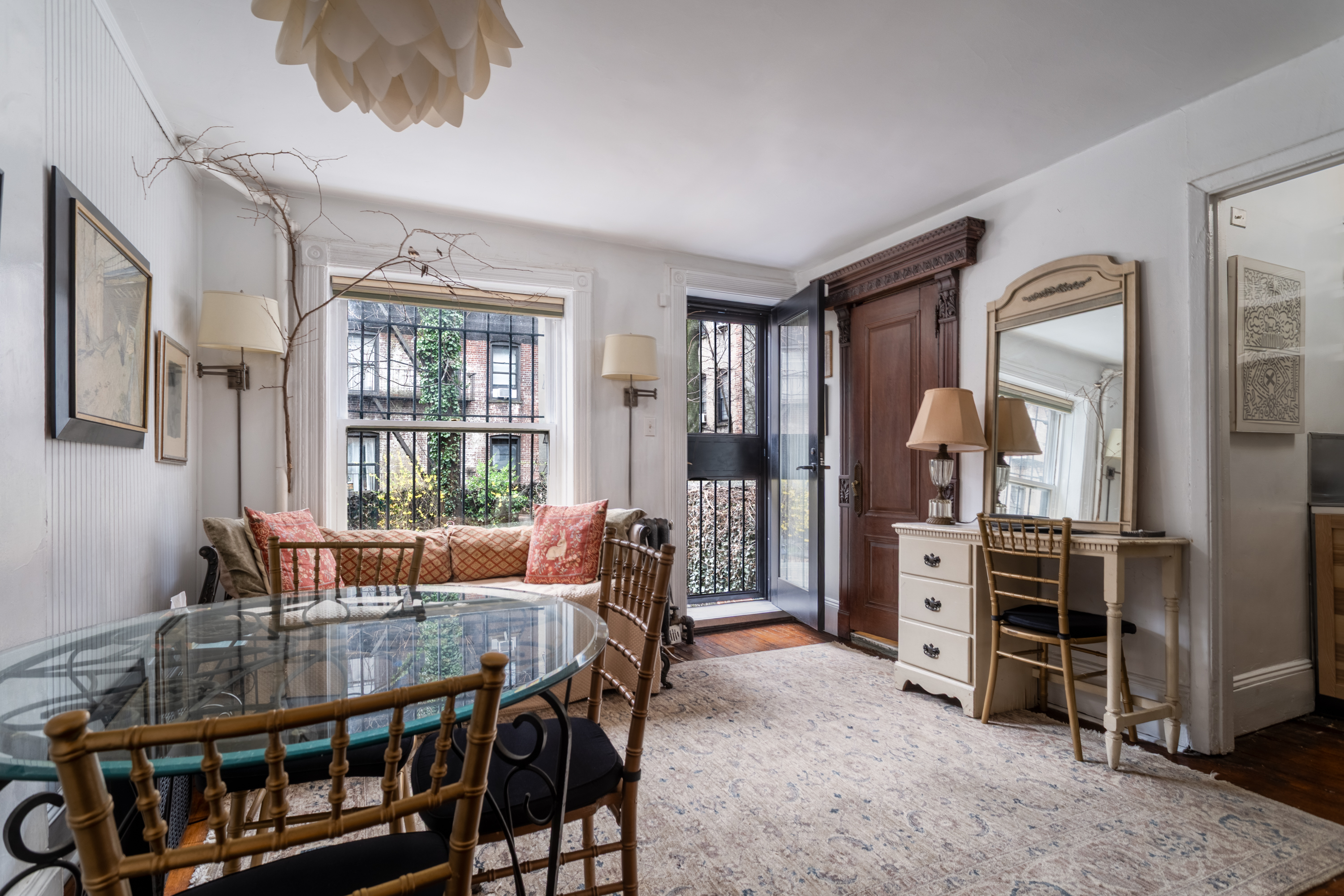 426 West 160th Street Manhattan, NY 10032 - Photo 25 of 33 a view of a dining room with furniture window and outside view