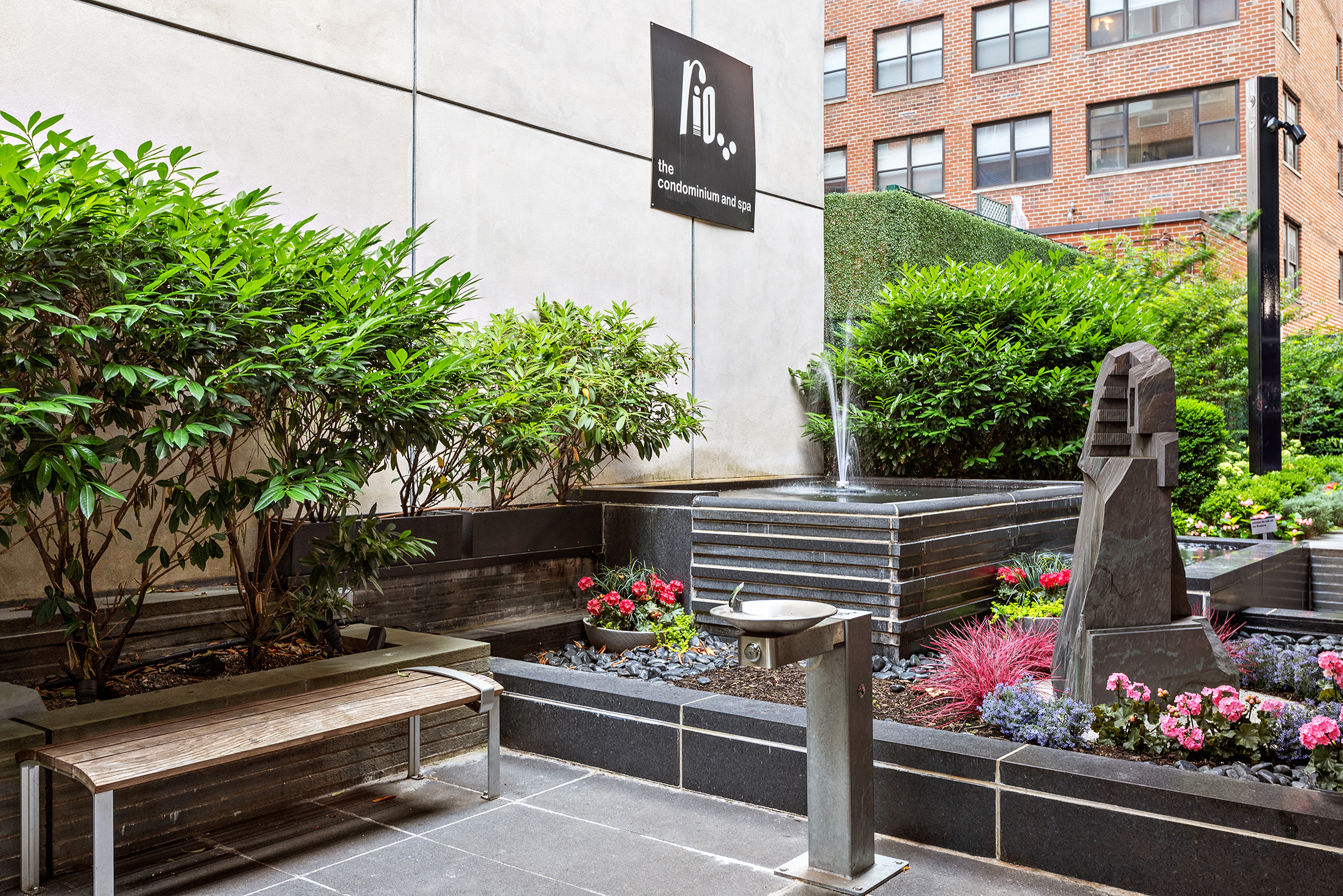 304 East 65th Street, Unit 14D Manhattan, NY 10065 - Photo 10 of 14 a view of street with wooden fence