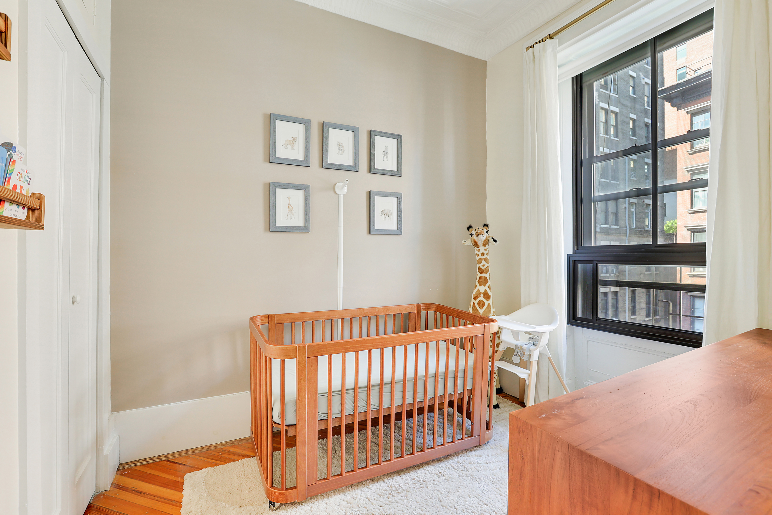 5 Great Jones Street Manhattan, NY 10012 - Photo 9 of 11 a view of a bedroom with wooden floor