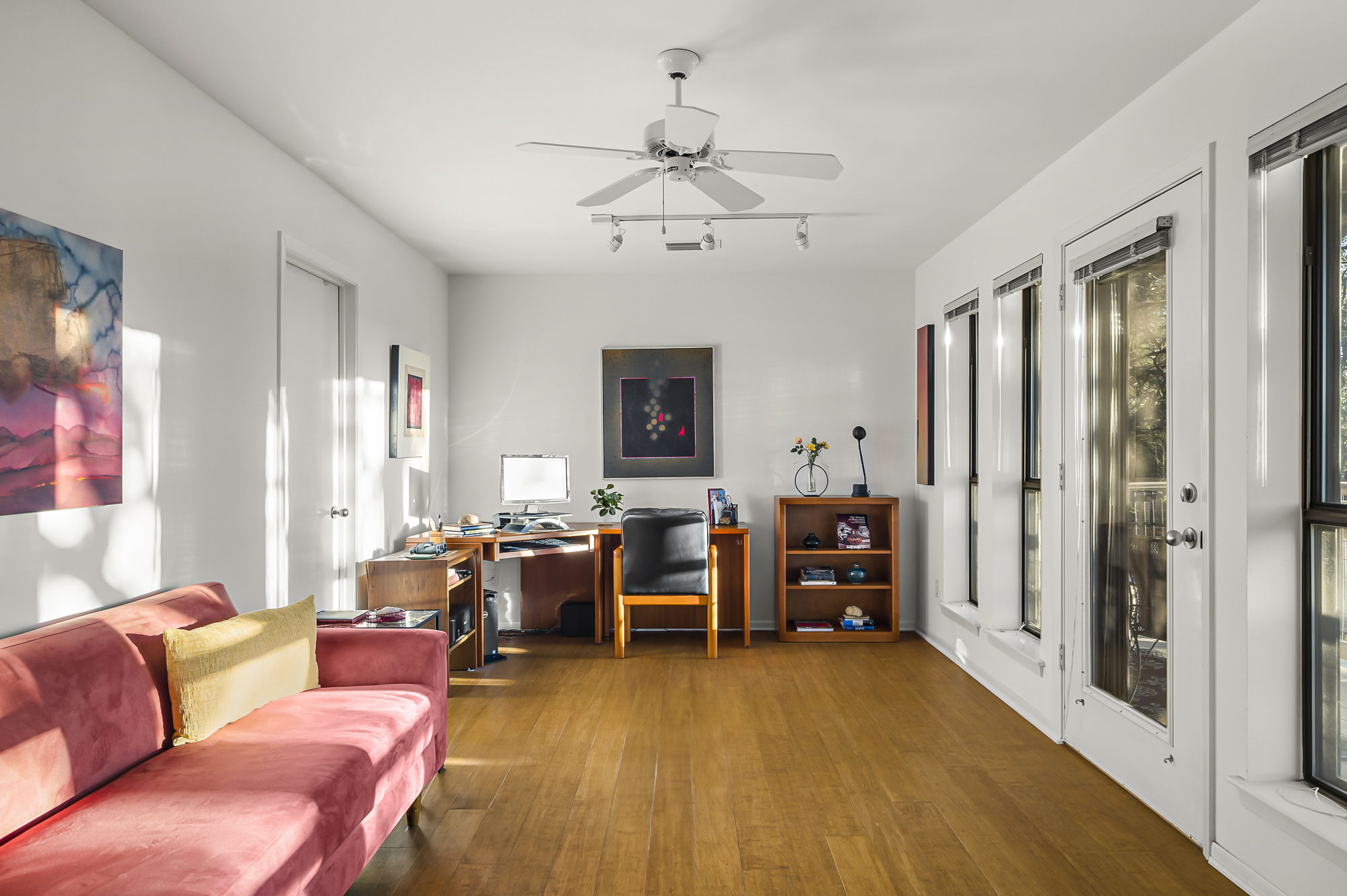 1605 The High Road Austin, TX 78746 - Photo 32 of 45 a living room with furniture or couch and a chandelier